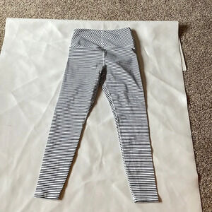 GLYDERO white and hunter green woman’s striped english riding pants.